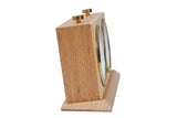 Pendule mécanique en bois vue de côté