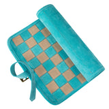 Jeu d'échecs enroulable en daim turquoise avec pièces en métal